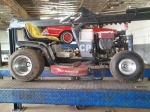 Side view of mower old auto mechanics AZ, Gilbert