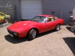 Classic red car side angle custom exhaust Tempe, AZ