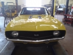 Front view of classic yellow custom auto work Mesa AZ