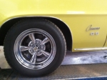 View of tire yellow classic car auto services Mesa Arizona